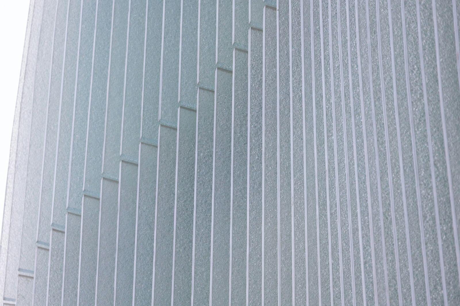 Modern building facade with repeating vertical lines